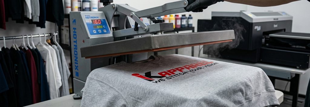 DTG printing process on a cotton hoodie blank
